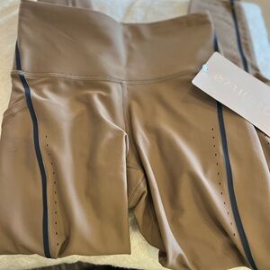 Athleta Interval Stash Tipped Laser Cut 7/8 Tight in powermove fabric NWT Multi